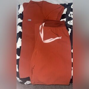 Auburn figs in great condition.Pants are high waisted Livingston